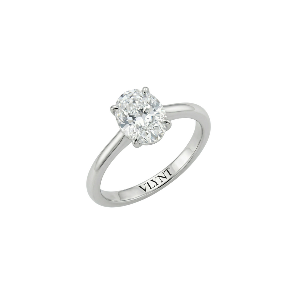 2ct oval shaped diamond ring: 18K vermail